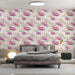 Une chambre moderne avec un papier peint floral aux motifs de lotus roses sur fond clair, créant une atmosphère douce et apaisante.