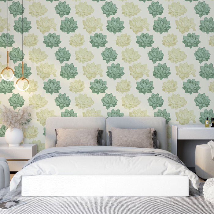 Une chambre apaisante avec un papier peint floral représentant des nénuphars dans des teintes de vert et jaune sur fond clair.