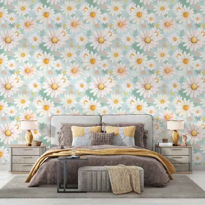 Une chambre apaisante avec un papier peint floral aux grandes marguerites blanches et jaunes sur fond pastel, créant une atmosphère douce et accueillante.