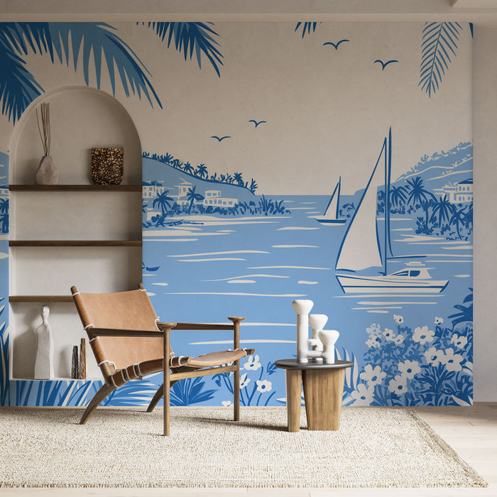 Une pièce lumineuse avec un papier peint tropical bleu illustrant des voiliers et des palmiers, créant une ambiance estivale et relaxante.
