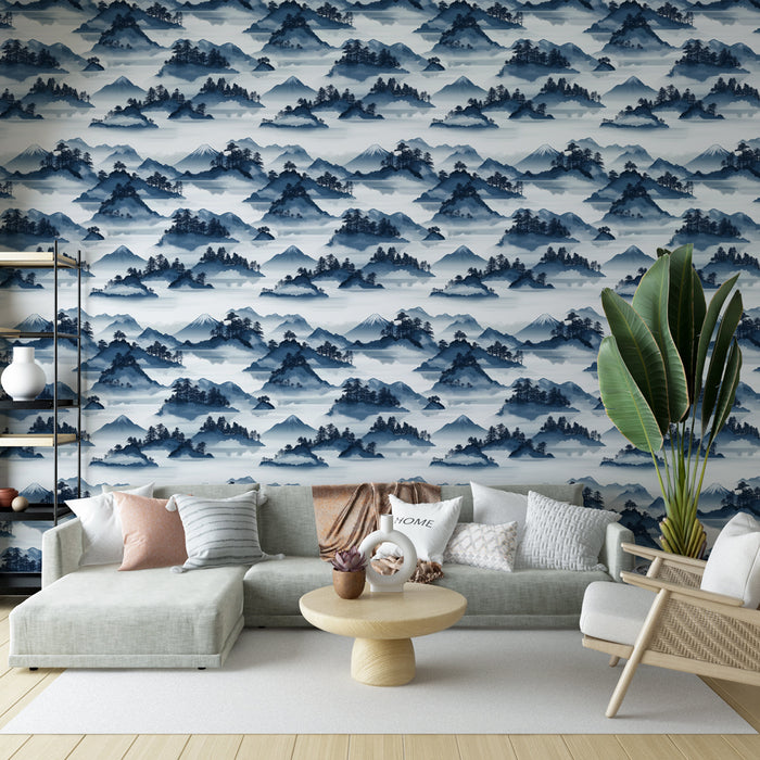 Un salon moderne avec un papier peint représentant des paysages montagneux en nuances de bleu, créant une ambiance apaisante et contemplative.