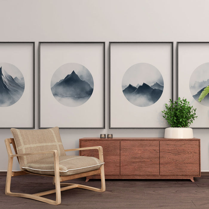 Une pièce moderne avec des œuvres encadrées représentant des montagnes en aquarelle, créant une ambiance apaisante et naturelle.