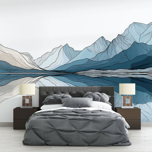 Une chambre moderne avec un papier peint représentant des montagnes stylisées en nuances de bleu et beige, créant une atmosphère apaisante et naturelle.