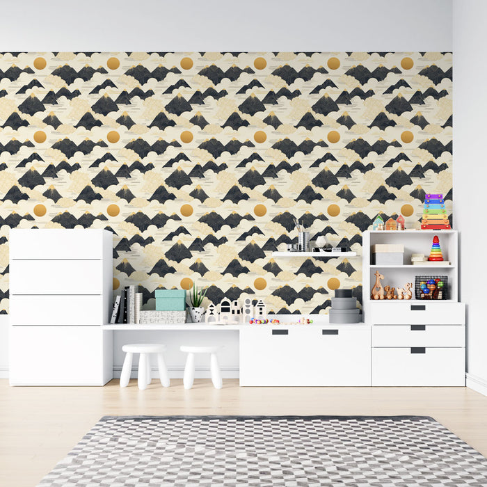 Une chambre d'enfant avec un papier peint aux motifs de montagnes stylisées en noir et or sur fond crème, créant une atmosphère ludique et moderne.