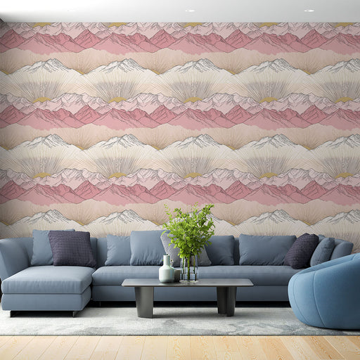 Un salon moderne avec un papier peint représentant des montagnes en dégradés de rose et beige, créant une atmosphère douce et apaisante.