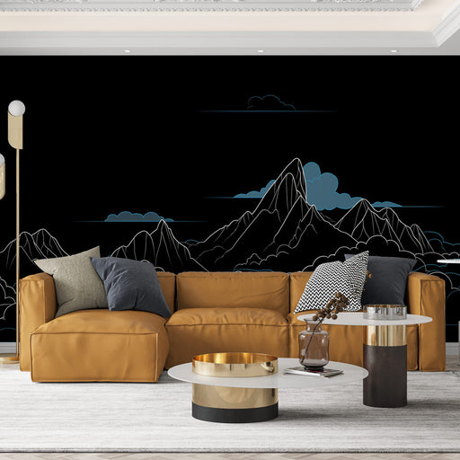 Un salon contemporain avec un papier peint représentant des montagnes stylisées en bleu sur fond noir, créant une ambiance à la fois élégante et apaisante.