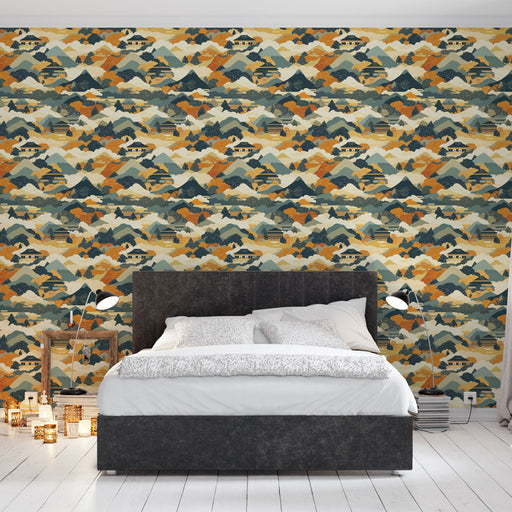 Une chambre moderne avec un papier peint aux motifs de montagnes stylisées en bleu, orange et beige, créant une ambiance chaleureuse et apaisante.