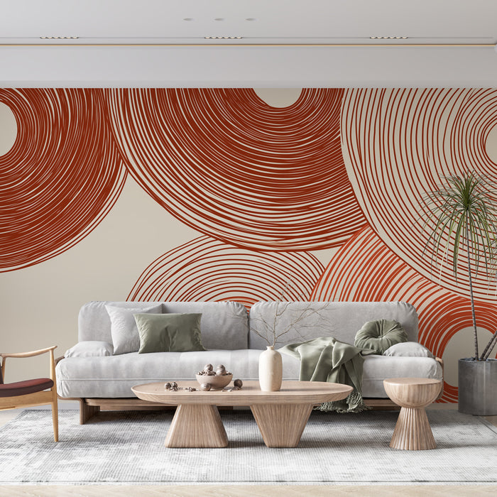 Une pièce moderne avec un papier peint aux motifs circulaires en rouge terre sur fond beige, créant une ambiance chaleureuse et dynamique.