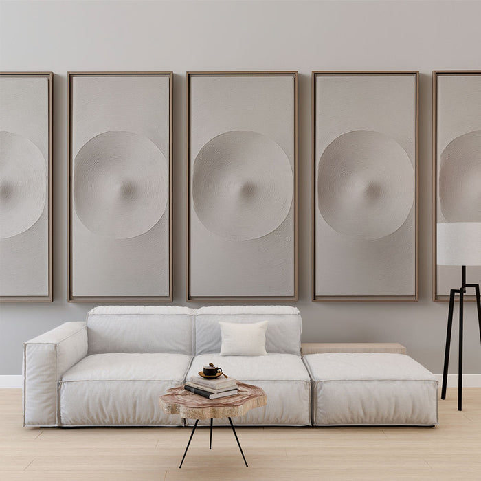 Un salon moderne avec un papier peint texturé beige clair, mettant en valeur des motifs circulaires subtils qui apportent une atmosphère élégante et apaisante.