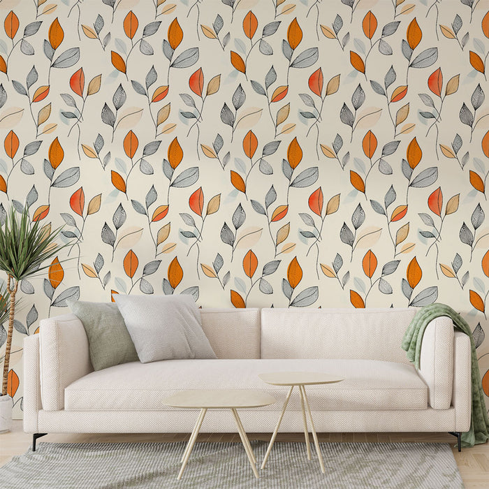 Un salon moderne avec un papier peint floral aux motifs de feuilles stylisées en orange, gris et beige sur fond clair, créant une ambiance chaleureuse et accueillante.