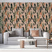 Un salon moderne avec un papier peint aux motifs organiques et colorés, mêlant des teintes de vert, orange et noir sur fond rose, créant une ambiance chaleureuse et accueillante.