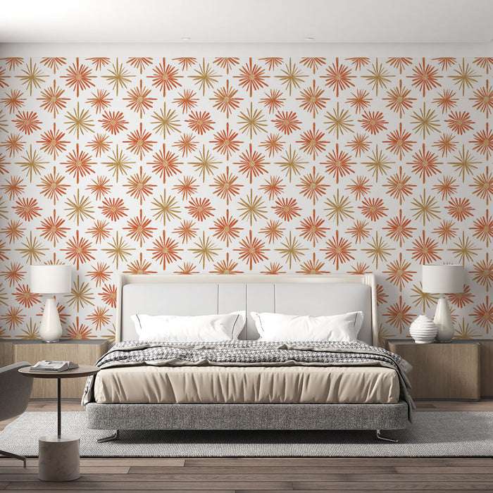 Une chambre moderne avec un papier peint rétro aux motifs étoilés orange et doré sur fond blanc, créant une atmosphère chaleureuse et dynamique.