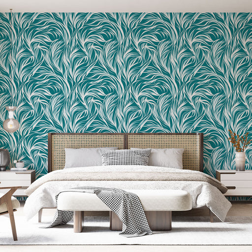 Une chambre moderne avec un papier peint aux motifs fluides blancs sur fond turquoise, créant une ambiance dynamique et apaisante.