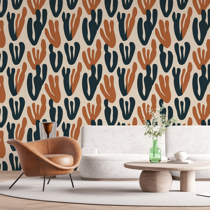 Une pièce moderne avec un papier peint aux motifs abstraits de cactus dans des teintes de bleu marine et terracotta sur fond crème, créant une atmosphère chaleureuse et accueillante.