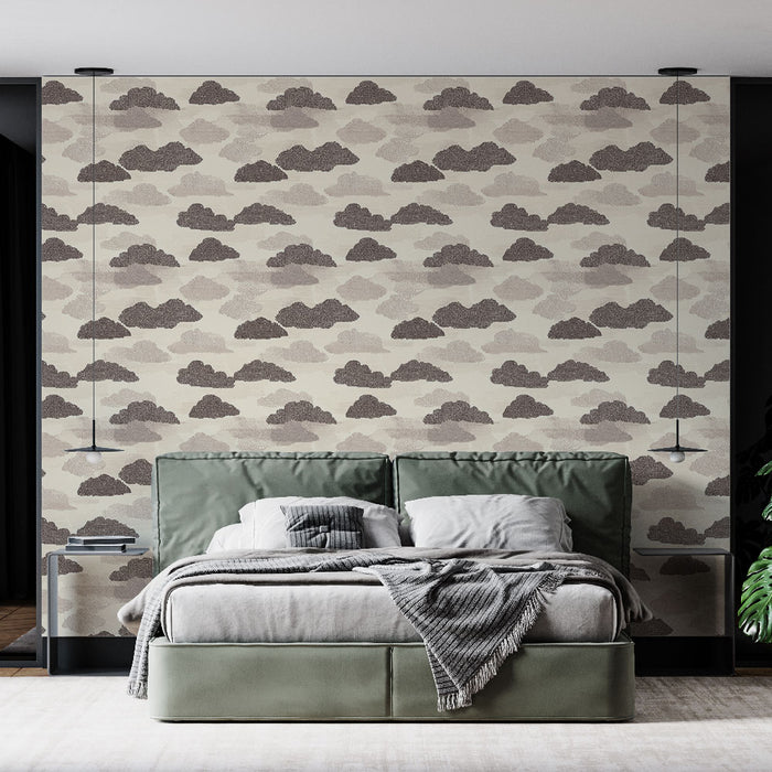 Une chambre moderne avec un papier peint représentant des nuages dans des teintes douces de beige et marron, créant une atmosphère apaisante et rêveuse.