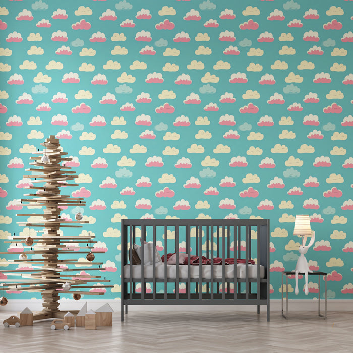 Une chambre d'enfant avec un papier peint ludique représentant des nuages colorés sur fond turquoise, créant une ambiance joyeuse et apaisante.