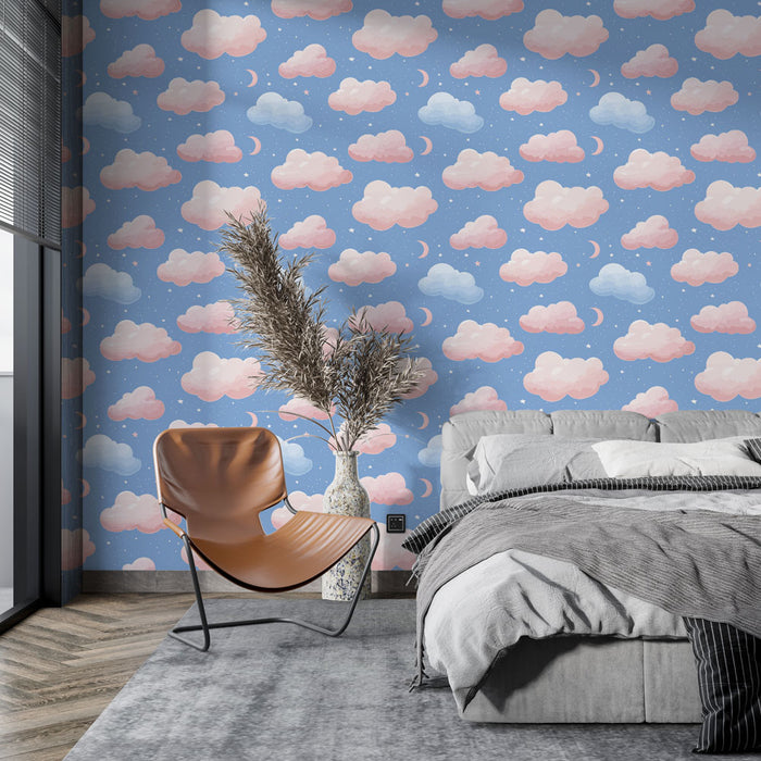 Une chambre moderne avec un papier peint évoquant un ciel nocturne, orné de nuages roses et de lunes sur fond bleu, créant une atmosphère douce et rêveuse.