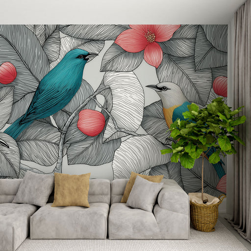 Un salon moderne avec un papier peint illustrant des oiseaux colorés sur fond de feuillage stylisé, créant une ambiance vivante et naturelle.