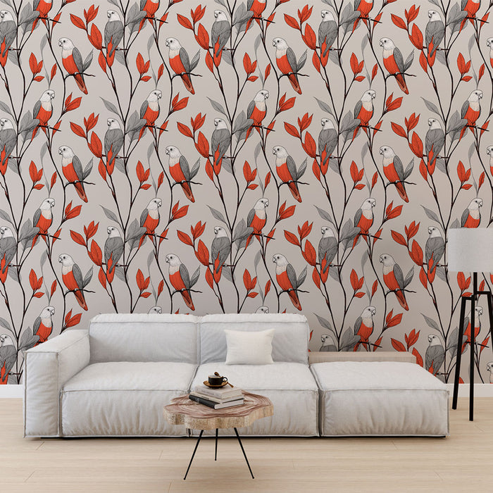 Un salon moderne avec un papier peint illustrant des perroquets stylisés sur des branches ornées de feuilles rouges, créant une atmosphère vivante et chaleureuse.