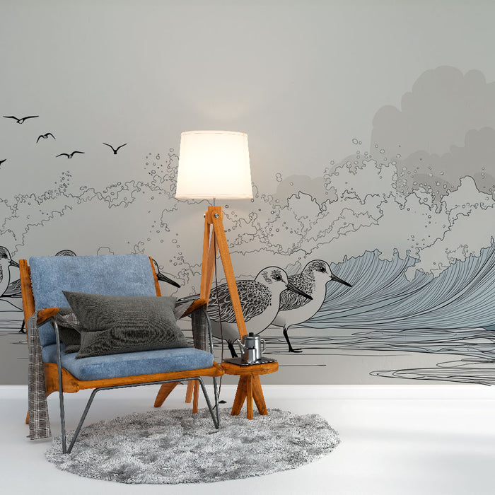 Une pièce moderne avec un papier peint illustrant des oiseaux en bord de mer et des vagues stylisées sur fond gris, créant une ambiance apaisante et artistique.