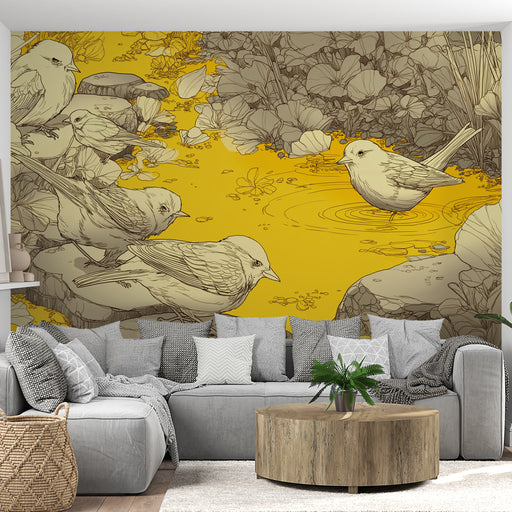 Une pièce de vie moderne avec un papier peint illustrant des oiseaux en contours noirs sur un fond jaune vif, créant une ambiance joyeuse et dynamique.