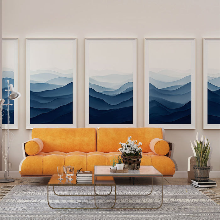 Un salon moderne avec un papier peint représentant des vagues en dégradé de bleus, créant une atmosphère apaisante et élégante.