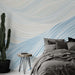 Papier peint ondulations avec motif de vagues douces en bleu et crème pour chambre moderne