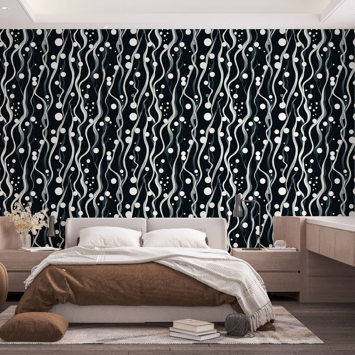 Une chambre moderne avec un papier peint abstrait noir orné de motifs ondulés et de cercles blancs, créant une ambiance dynamique et élégante.