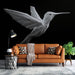 Papier peint origami colibri blanc sur fond noir pour salon moderne et élégant