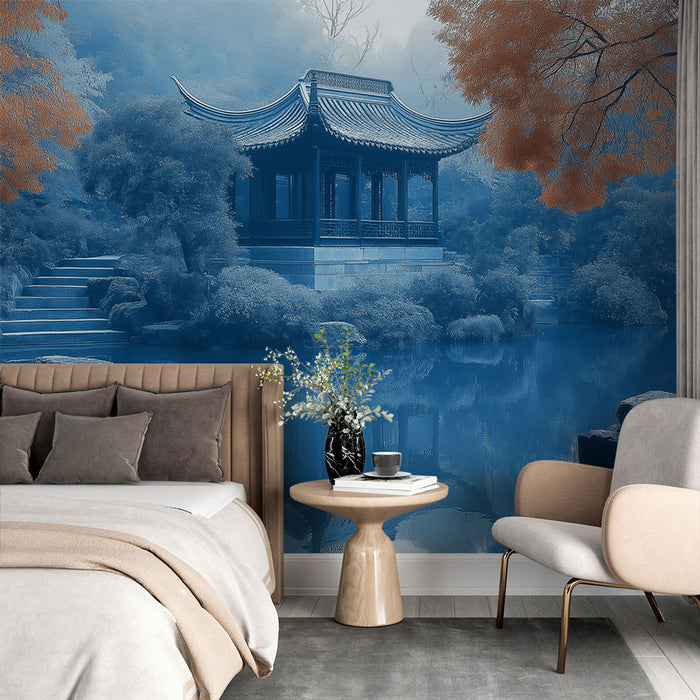 Une chambre élégante avec un papier peint représentant un paysage asiatique en nuances de bleu, créant une atmosphère apaisante et contemplative.