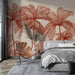 Une chambre moderne avec un papier peint représentant des palmiers en lignes rouge sur fond beige, créant une ambiance chaleureuse et tropicale.