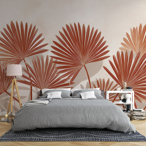 Une chambre moderne avec un papier peint représentant de grandes feuilles de palmier dans des teintes terracotta, créant une ambiance chaleureuse et naturelle.