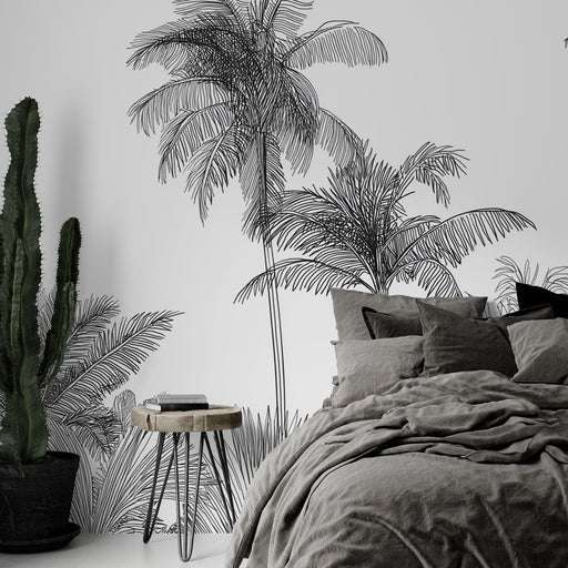 Une chambre moderne avec un papier peint représentant des palmiers en lignes noires sur fond blanc, créant une atmosphère apaisante et artistique.