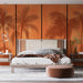 Une chambre moderne avec un papier peint tropical orange représentant des palmiers en silhouette, créant une ambiance chaleureuse et ensoleillée.