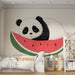 Une chambre d'enfant avec un papier peint illustrant un panda endormi sur une tranche de pastèque, créant une atmosphère ludique et douce.