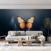 Papier peint papillon orange lumineux sur fond sombre pour salon moderne