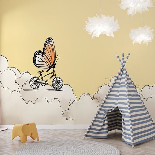 Une chambre d'enfant avec un papier peint illustratif représentant un vélo sur des nuages, sur fond jaune, créant une atmosphère ludique et rêveuse.
