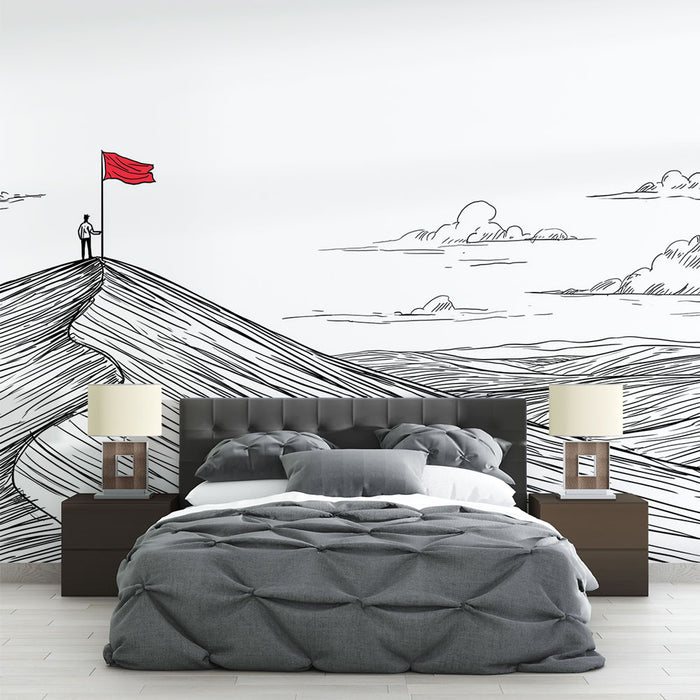 Une chambre moderne avec un papier peint illustratif représentant des collines stylisées en noir et blanc, où un personnage brandit un drapeau rouge, créant une ambiance inspirante et artistique.