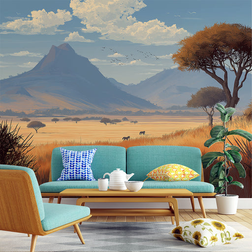 Un salon lumineux avec un papier peint représentant un paysage africain aux teintes chaudes, évoquant une ambiance sereine et naturelle.