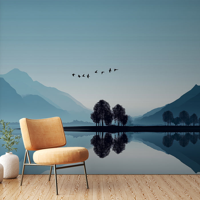 Une pièce moderne avec un papier peint représentant un paysage apaisant aux nuances de bleu, évoquant des montagnes et des arbres reflétés dans l'eau.