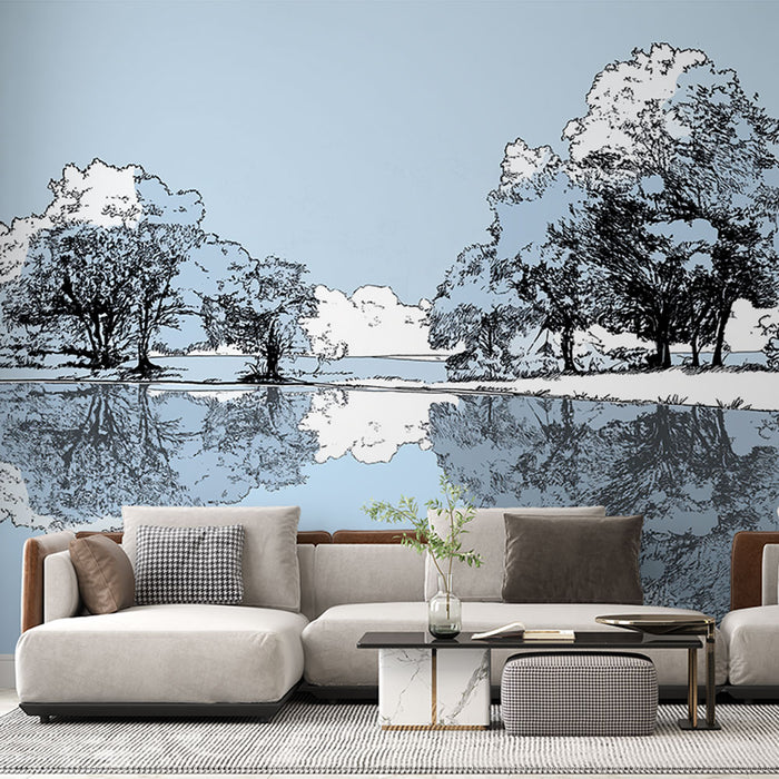Un salon moderne avec un papier peint représentant un paysage aquarelle bleu et noir, évoquant calme et sérénité grâce à ses motifs d'arbres et de reflets.