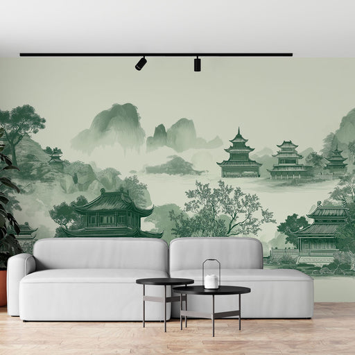 Un salon contemporain avec un papier peint représentant un paysage asiatique en nuances de vert, évoquant sérénité et harmonie.