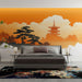 Une chambre moderne avec un papier peint représentant un paysage asiatique en dégradé orange, évoquant sérénité et harmonie.
