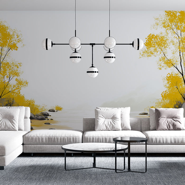 Un salon moderne avec un papier peint représentant un paysage apaisant en nuances de gris et jaune, évoquant une atmosphère sereine et naturelle.