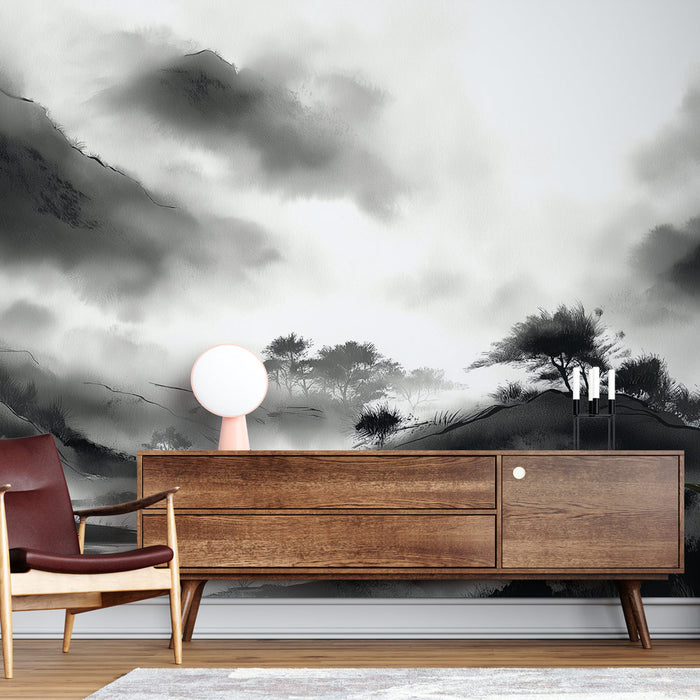 Une pièce moderne avec un papier peint en noir et blanc représentant un paysage brumeux, créant une atmosphère apaisante et contemplative.
