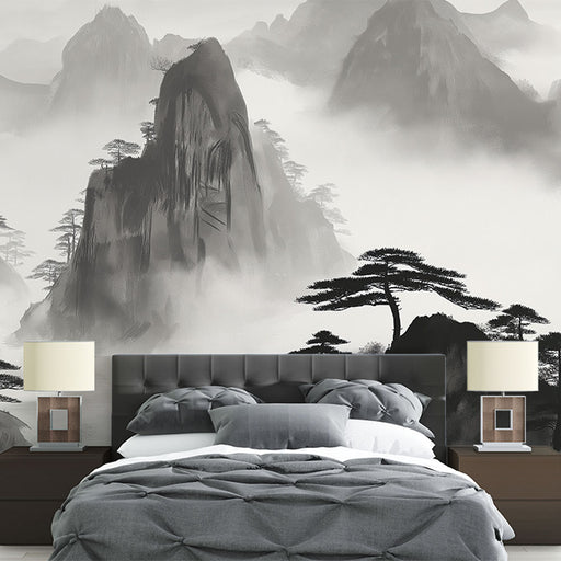 Une chambre apaisante avec un papier peint représentant des paysages montagneux en noir et blanc, créant une atmosphère zen et sereine.