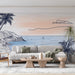 Papier peint paysage côtier avec coucher de soleil apaisant sur la plage pour salon moderne.