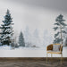 Une pièce contemporaine avec un papier peint représentant une forêt enneigée aux teintes froides, créant une atmosphère paisible et hivernale.