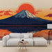 Un salon contemporain avec un papier peint représentant le mont Fuji au coucher de soleil, mêlant des teintes chaudes d'orange et de bleu, créant une atmosphère apaisante et inspirante.