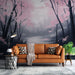 Un salon contemporain avec un papier peint représentant un paysage brumeux aux arbres sombres et des touches de fleurs roses, créant une atmosphère paisible et rêveuse.